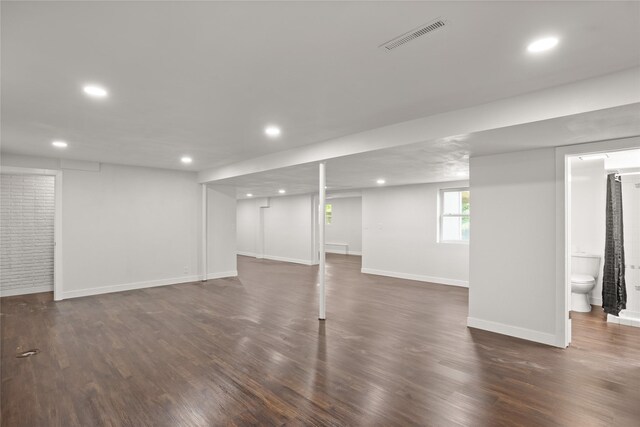 817 Roberts Ter, Marshalltown, IA 50158 - below grade area with recessed lighting, baseboards, and dark wood-type flooring