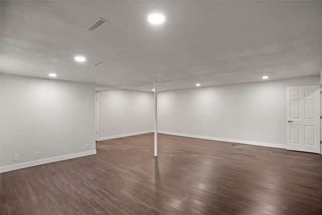 817 Roberts Ter, Marshalltown, IA 50158 - finished basement with recessed lighting, dark wood-type flooring, and baseboards