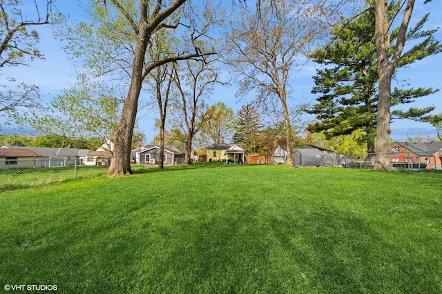 1073 66th St, Windsor Heights, IA 50324 - view of yard with a residential view