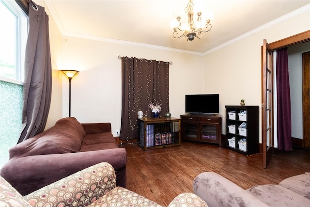 3417 6th Ave, Des Moines, IA 50313 - living area featuring wood finished floors, a chandelier, and crown molding