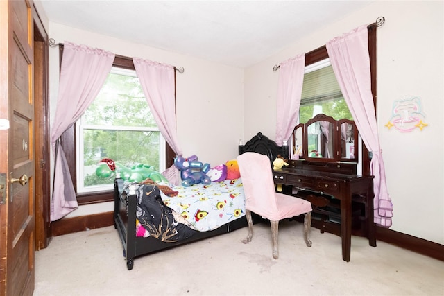 3417 6th Ave, Des Moines, IA 50313 - bedroom with carpet floors and baseboards