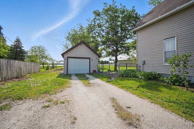 417 NE 2nd St, Panora, IA 50216 - detached garage with dirt driveway