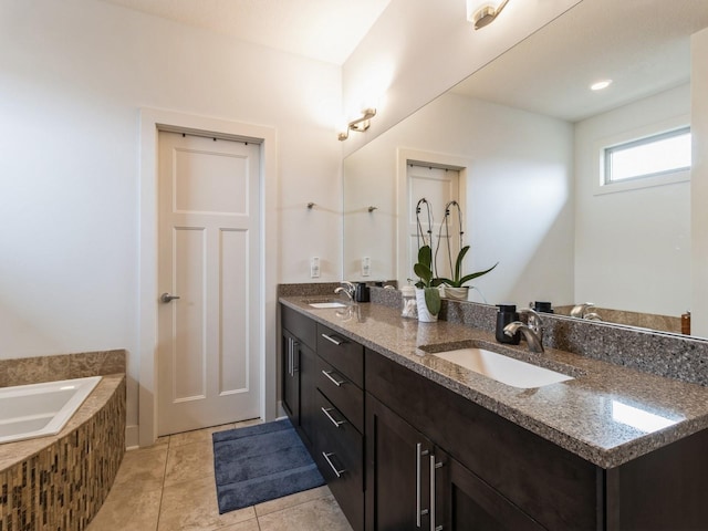 4485 NW 167th St, Clive, IA 50325 - bathroom featuring double vanity, a bath, and tile patterned flooring