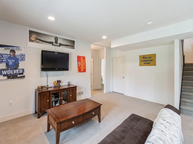 4485 NW 167th St, Clive, IA 50325 - living area with stairs, light carpet, recessed lighting, and baseboards