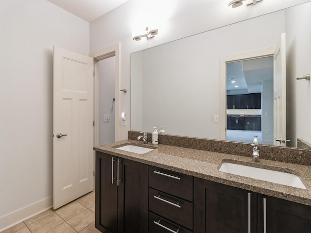 4485 NW 167th St, Clive, IA 50325 - bathroom featuring double vanity and tile patterned flooring