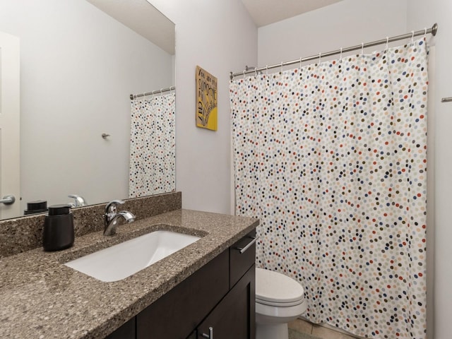 4485 NW 167th St, Clive, IA 50325 - bathroom with vanity, toilet, a shower with curtain, and tile patterned floors