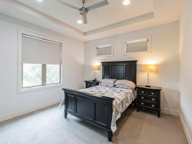 4485 NW 167th St, Clive, IA 50325 - bedroom with light colored carpet, baseboards, recessed lighting, and a tray ceiling