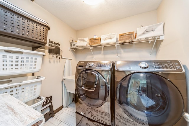 2502 Eagle Ridge Dr, Granger, IA 50109 - washroom with washing machine and clothes dryer