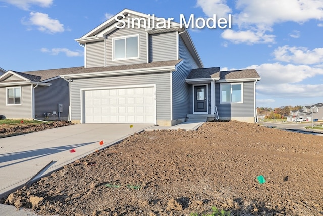 429 Napoli Ave, West Des Moines, IA 50266 - traditional home with a garage, concrete driveway, and a shingled roof