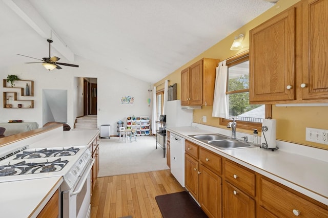 1801 Payton Ave, Des Moines, IA 50315 - kitchen with white appliances, a sink, open floor plan, light countertops, and light wood-type flooring
