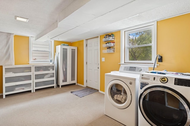 1801 Payton Ave, Des Moines, IA 50315 - laundry room with independent washer and dryer, carpet, and baseboards