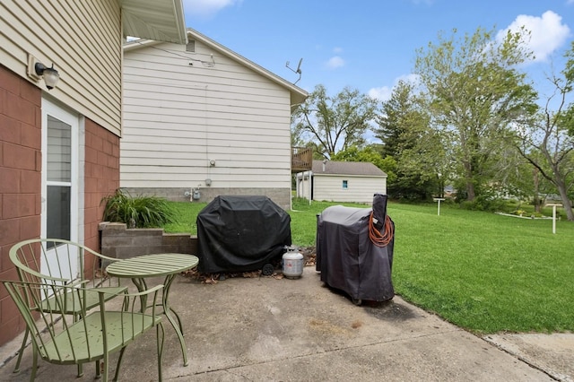 1801 Payton Ave, Des Moines, IA 50315 - view of patio featuring a grill