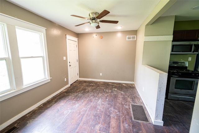 3518 Easton Blvd, Des Moines, IA 50317 - empty room with ceiling fan, baseboards, and wood finished floors