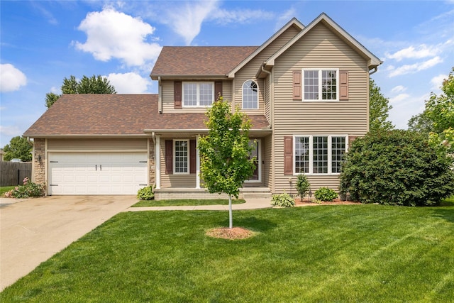 904 SE Little Beaver Dr, Grimes, IA 50111 - view of front of house with an attached garage, driveway, and roof with shingles
