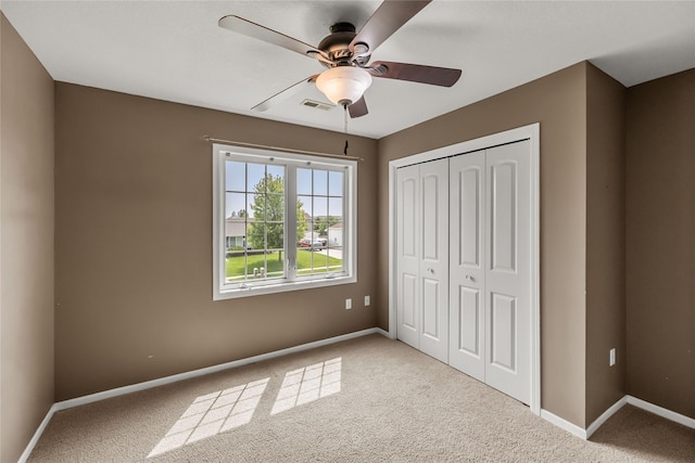 904 SE Little Beaver Dr, Grimes, IA 50111 - unfurnished bedroom featuring carpet flooring, baseboards, and a closet
