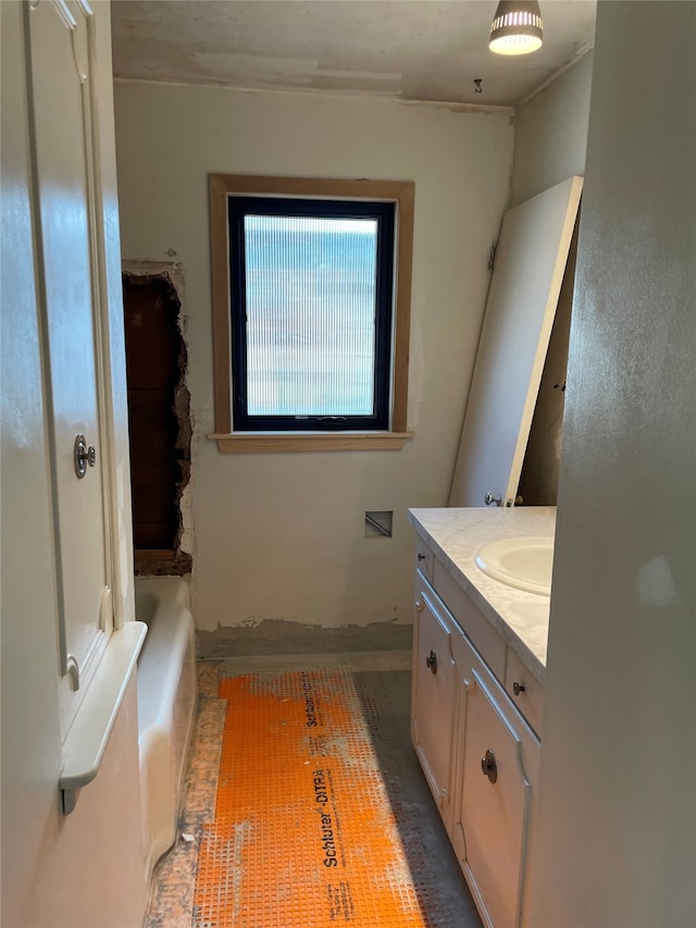 1620 Broad St, Grinnell, IA 50112 - empty room with a textured ceiling, carpet, built in shelves, and baseboards