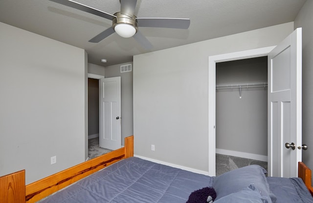 2930 Kestrel St, Norwalk, IA 50211 - bedroom featuring dark colored carpet, a closet, and ceiling fan
