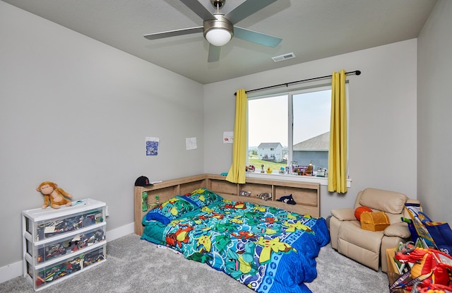 2930 Kestrel St, Norwalk, IA 50211 - carpeted bedroom featuring a ceiling fan and baseboards