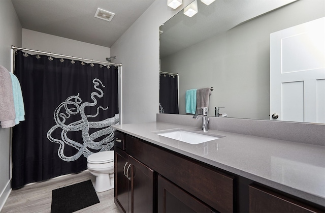 2930 Kestrel St, Norwalk, IA 50211 - full bath featuring wood finished floors, vanity, and curtained shower