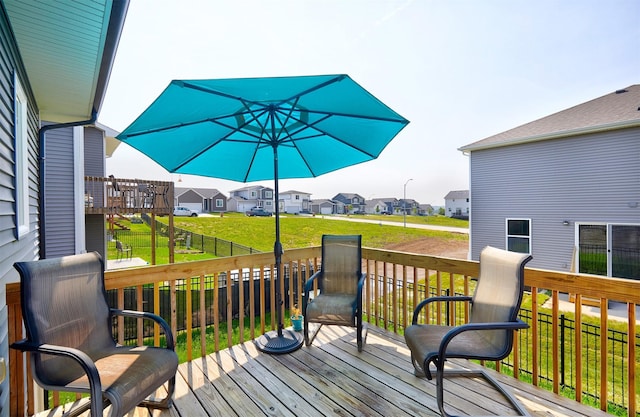 2930 Kestrel St, Norwalk, IA 50211 - deck featuring a residential view and a lawn