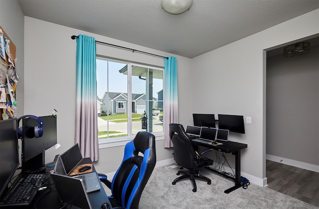 2930 Kestrel St, Norwalk, IA 50211 - home office with baseboards and wood finished floors