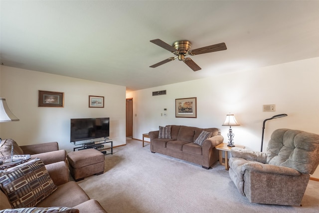 530 Stuart St, Carlisle, IA 50047 - living area featuring light carpet and a ceiling fan