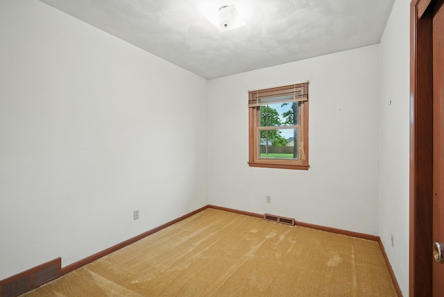 4500 100th St, Urbandale, IA 50322 - empty room featuring baseboards and carpet floors