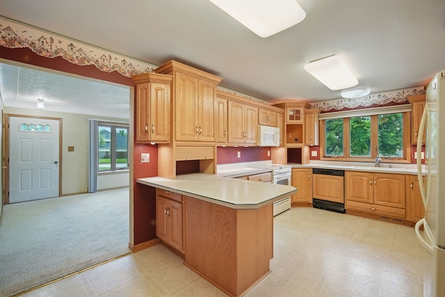 4500 100th St, Urbandale, IA 50322 - kitchen featuring white appliances, a peninsula, light countertops, light flooring, and light carpet