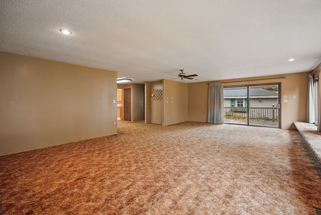 4500 100th St, Urbandale, IA 50322 - empty room with carpet flooring, a textured ceiling, and a ceiling fan