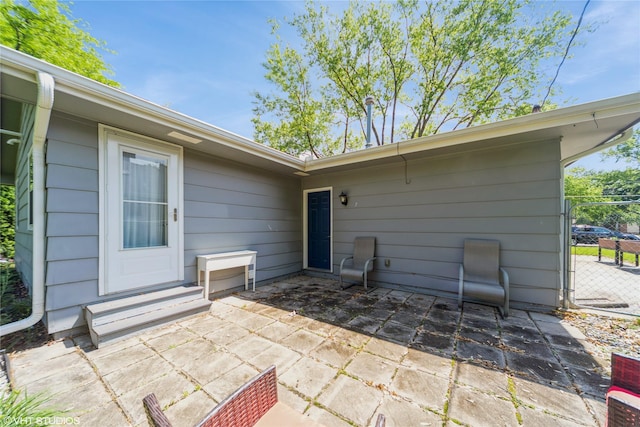 312 NE Harvey St, Grimes, IA 50111 - view of patio / terrace with entry steps and a gate