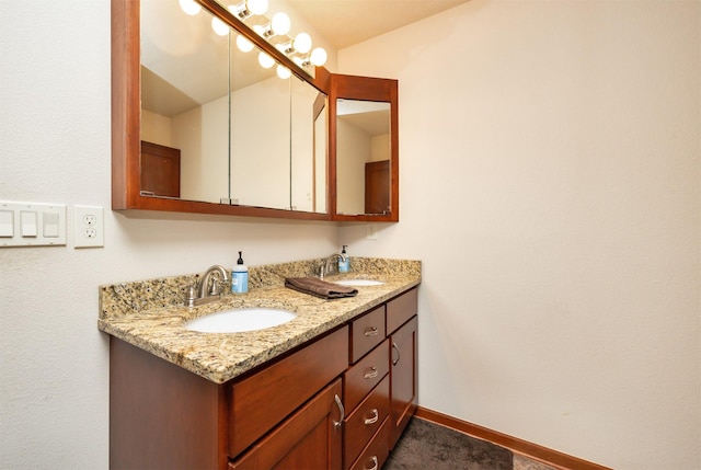 1324 Joshua Cir SE, Bondurant, IA 50035 - full bath featuring double vanity and baseboards