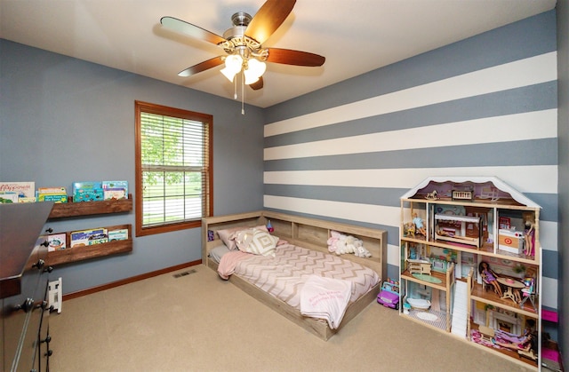 1324 Joshua Cir SE, Bondurant, IA 50035 - bedroom with carpet, baseboards, and a ceiling fan
