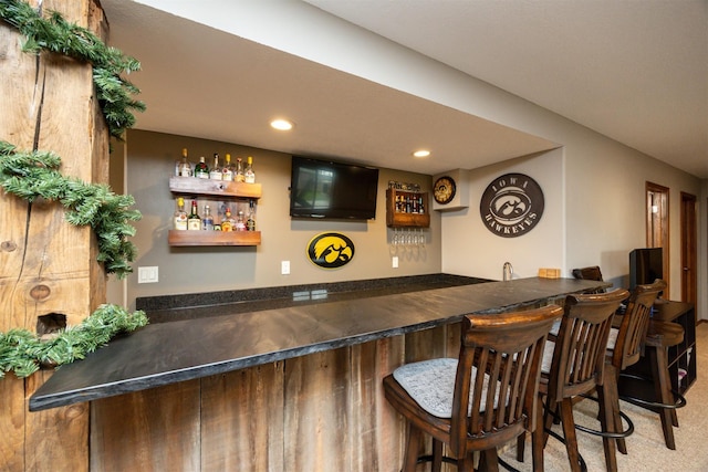 1324 Joshua Cir SE, Bondurant, IA 50035 - indoor wet bar with recessed lighting and carpet flooring