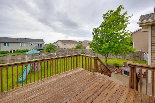 1324 Joshua Cir SE, Bondurant, IA 50035 - wooden deck featuring a residential view