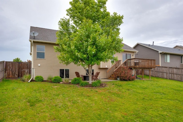 1324 Joshua Cir SE, Bondurant, IA 50035 - back of house with a wooden deck and stairs