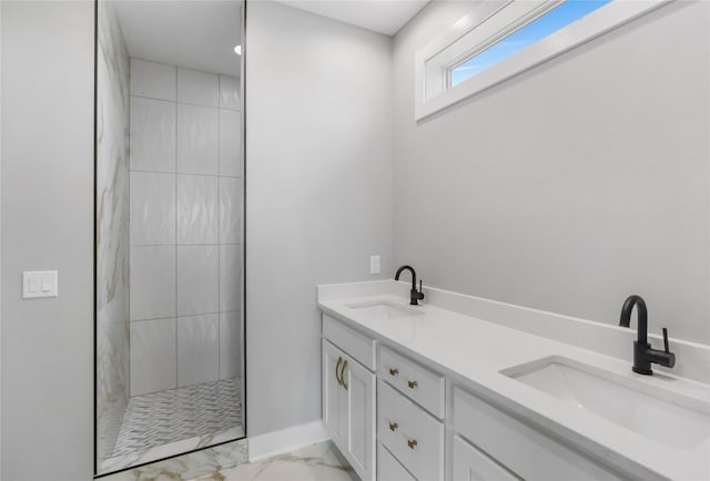 1201 Lakeview Cir NW, Bondurant, IA 50035 - bathroom featuring tiled shower, marble look tile flooring, and double vanity