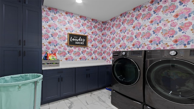 100 Coventry Ct, Clear Lake, IA 50428 - washroom with wallpapered walls, cabinet space, washer and clothes dryer, light marble finish flooring, and recessed lighting