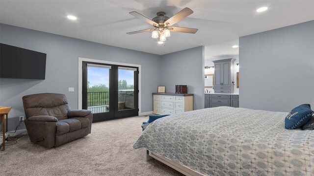100 Coventry Ct, Clear Lake, IA 50428 - bedroom with access to outside, light carpet, french doors, recessed lighting, and baseboards