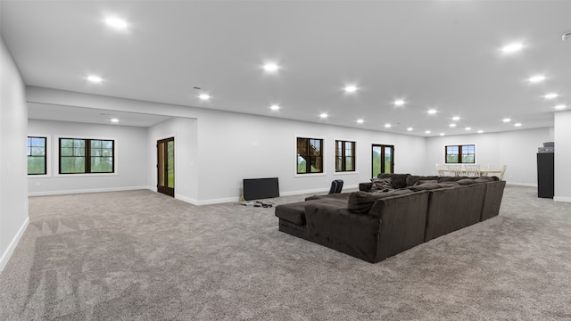 100 Coventry Ct, Clear Lake, IA 50428 - living area featuring carpet floors, recessed lighting, and baseboards