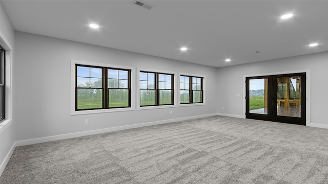 100 Coventry Ct, Clear Lake, IA 50428 - unfurnished room featuring recessed lighting, carpet floors, and baseboards
