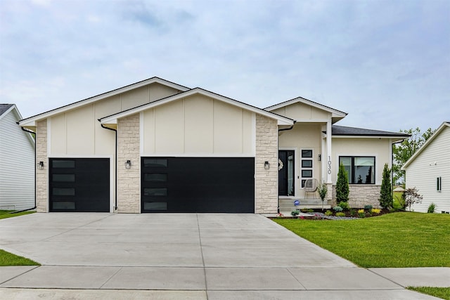1030 Harrington Way, Waukee, IA 50263 - contemporary home featuring an attached garage, stone siding, driveway, and a front yard
