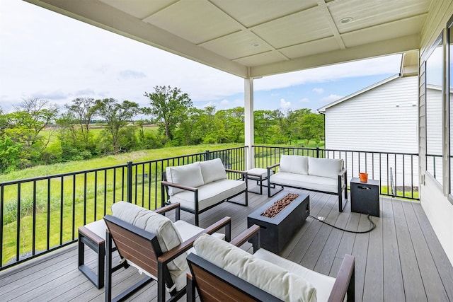 1030 Harrington Way, Waukee, IA 50263 - deck with an outdoor living space with a fire pit, view of scattered trees, and a yard