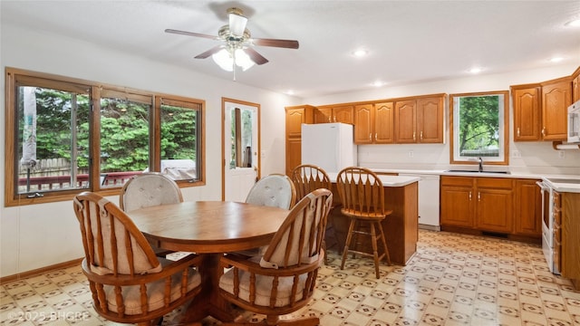 1105 E Henderson Pl, Indianola, IA 50125 - dining space featuring light flooring, ceiling fan, and recessed lighting