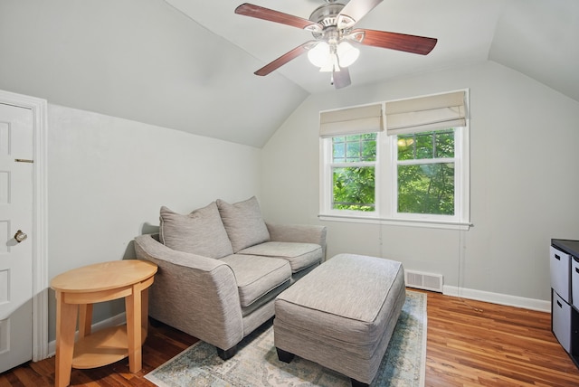 1526 41st Pl, Des Moines, IA 50311 - sitting room with lofted ceiling, wood finished floors, ceiling fan, and baseboards