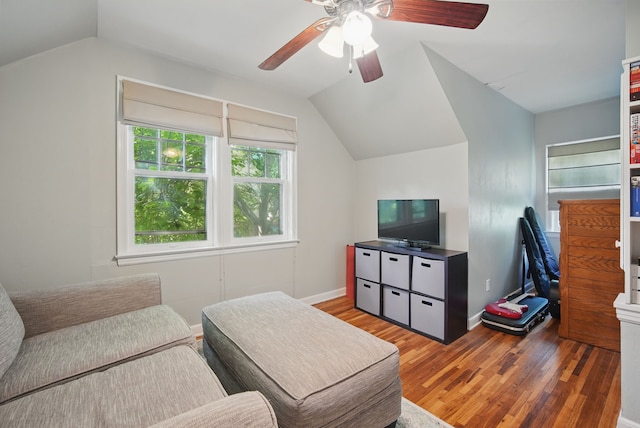 1526 41st Pl, Des Moines, IA 50311 - living area featuring vaulted ceiling, wood finished floors, a ceiling fan, and baseboards