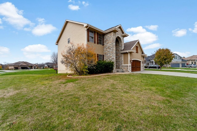 1738 Everwood Ct SW, Altoona, IA 50009 - view of front of house with stone siding, concrete driveway, a garage, a residential view, and a front yard