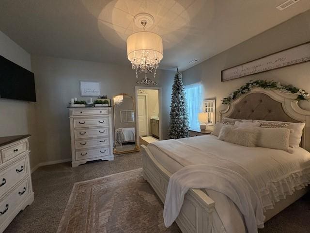 2807 NW 31st St, Ankeny, IA 50023 - bedroom with a chandelier, dark colored carpet, and baseboards