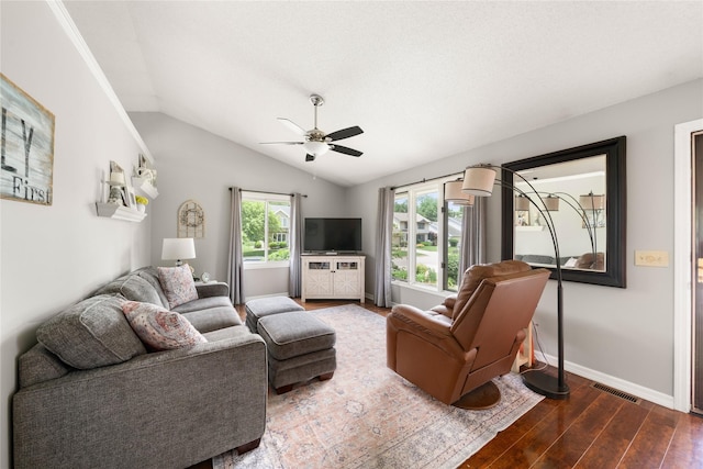 9640 Quail Run, Urbandale, IA 50322 - living area featuring ceiling fan, dark wood-style floors, vaulted ceiling, and baseboards