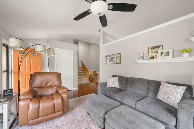 9640 Quail Run, Urbandale, IA 50322 - living area featuring wood finished floors, stairway, ceiling fan, and lofted ceiling