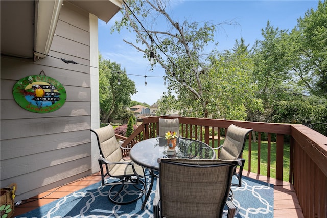 9640 Quail Run, Urbandale, IA 50322 - wooden terrace with outdoor dining space